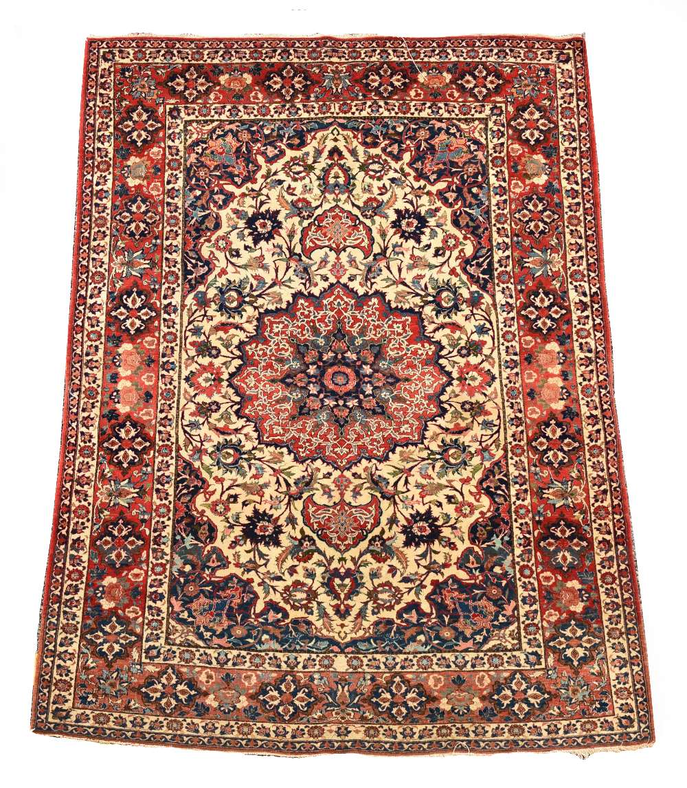 An Isfahan rug, 227 x 154cm (89 x 60in) Border fringe losses at one end, overal good levels of