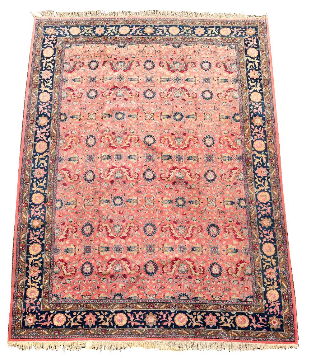 A Tabriz pink ground wool carpet, 484 x 345cm (189 x 135in) Good levels of pile and colours remain