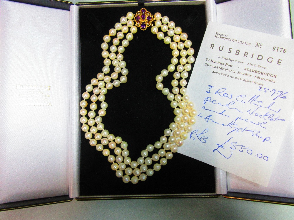 A three row pearl necklace with gold, amethyst and seed pearl clasp, the uniform 7.5-8mm cultured - Image 6 of 6