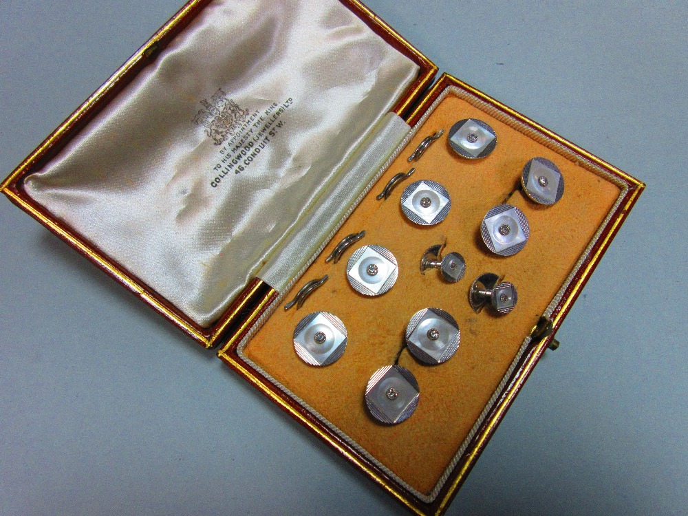 A complete diamond and mother-of-pearl dress set cased by Collingwood, comprising a pair of double-