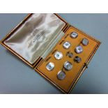 A complete diamond and mother-of-pearl dress set cased by Collingwood, comprising a pair of double-