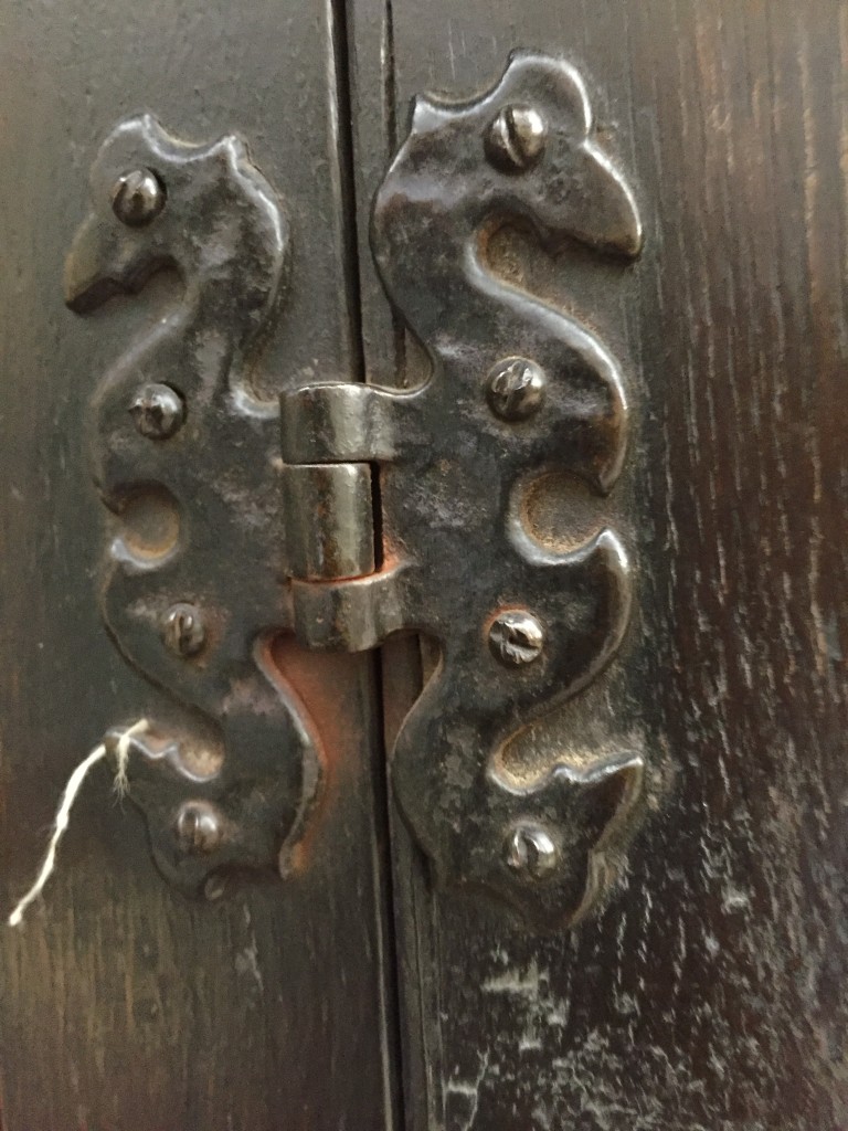 An 18th century oak panelled di-darne, with an over hung cornice and cupboards to the base, on stile - Image 4 of 4