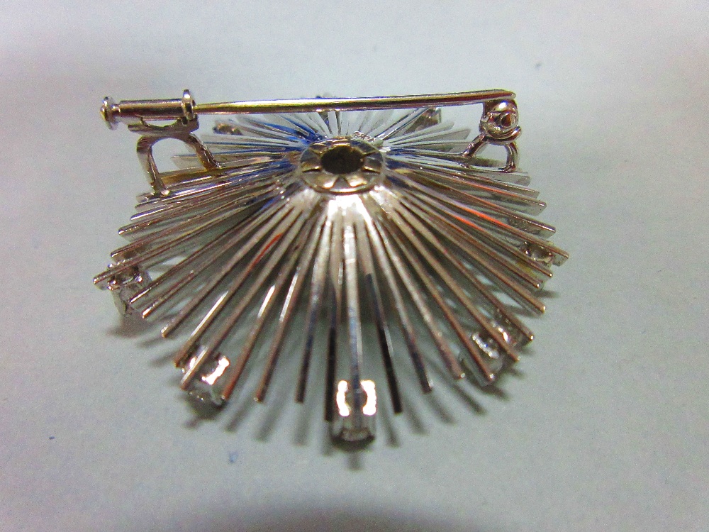 A mid 20th century diamond and sapphire flower brooch, formed by a central round cut sapphire in a - Image 3 of 4