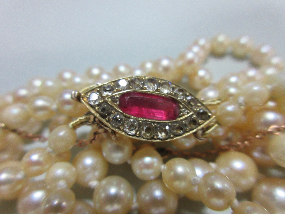 A two row pearl necklace with ruby and diamond clasp, the 3.6 - 8.0mm graduated pearls, to a navette - Image 5 of 7