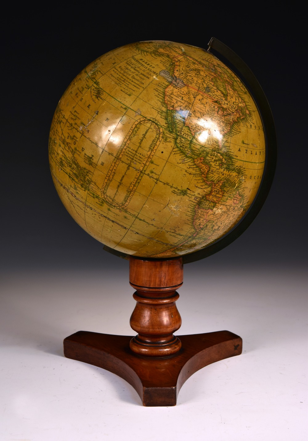 A Thomas Malby 8 inch terrestrial table globe, circa 1848, on a turned walnut tripod base 36cm (