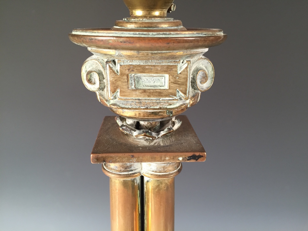 A 19th century gothic brass column lamp later converted as an electric lamp, the bowl nozzle on four - Image 2 of 3