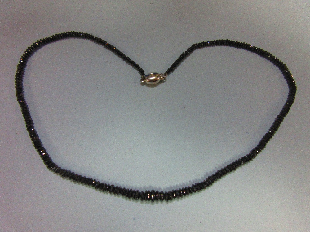 A black diamond bead necklace, the graduated 2.5 - 5.3mm diameter faceted black diamond beads, - Image 4 of 5