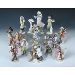 A Meissen fifteen piece monkey band, each of the figures singing or playing an instrument, a drummer