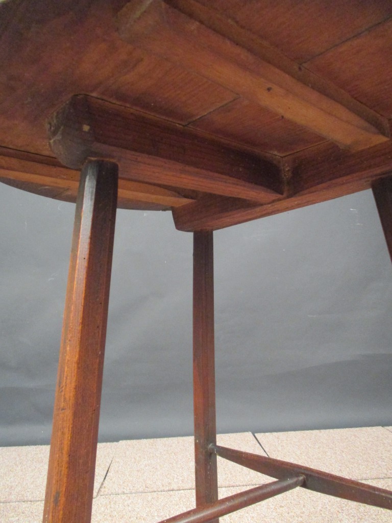 An 18th century oak and elm cricket table, on stretchered legs 67 x 61cm (26 x 24in) Evidence of old - Image 2 of 2