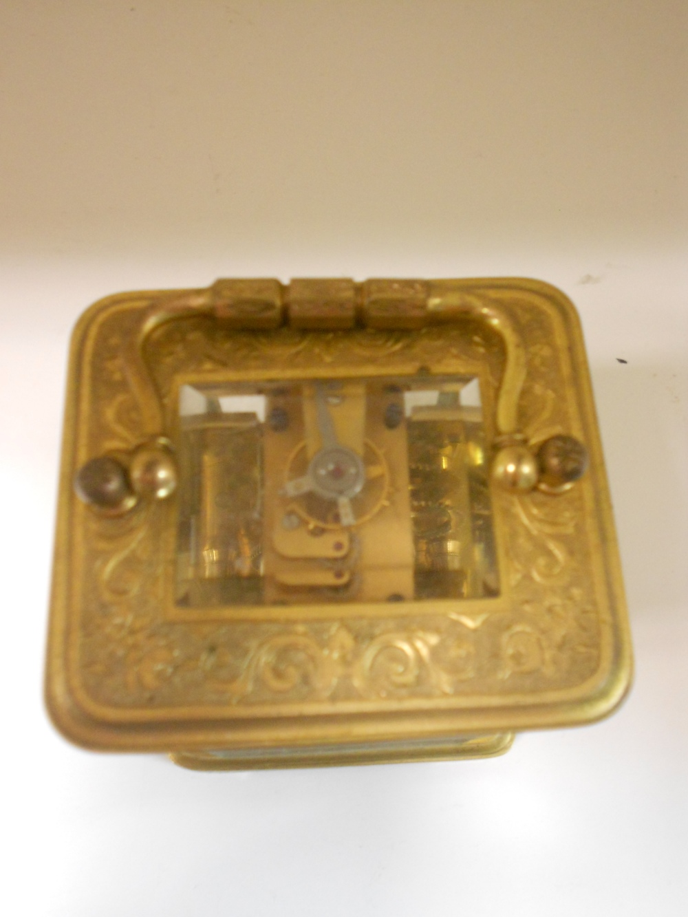 A small French gilt brass carriage timepiece, with floral scroll engraved case and 4.5cm rectangular - Image 4 of 4