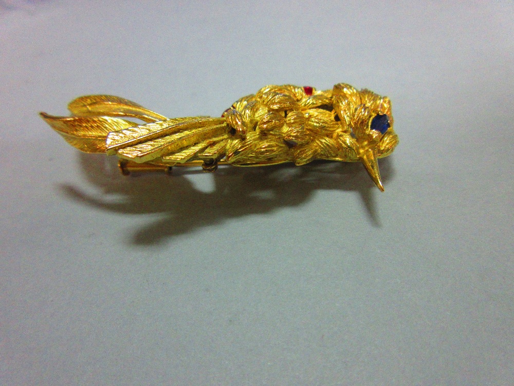 A ruby and sapphire bird brooch, the realistically modelled exotic bird with textured feathers, oval - Image 4 of 5