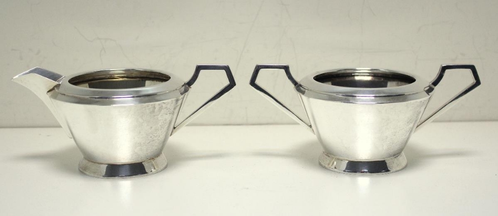 An Art Deco style silver four piece tea set, by The Barker Brothers, Birmingham 1935, comprising a - Image 9 of 9