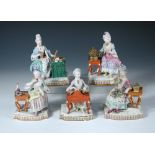 A set of five Meissen ladies seated stimulating their senses, one smelling a rose taken from the