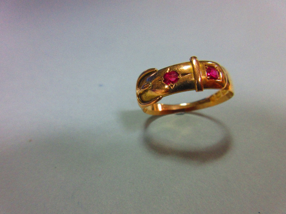 A Victorian 15ct gold buckle ring set with rubies, the two stones, one oval cut the other round cut, - Image 2 of 5