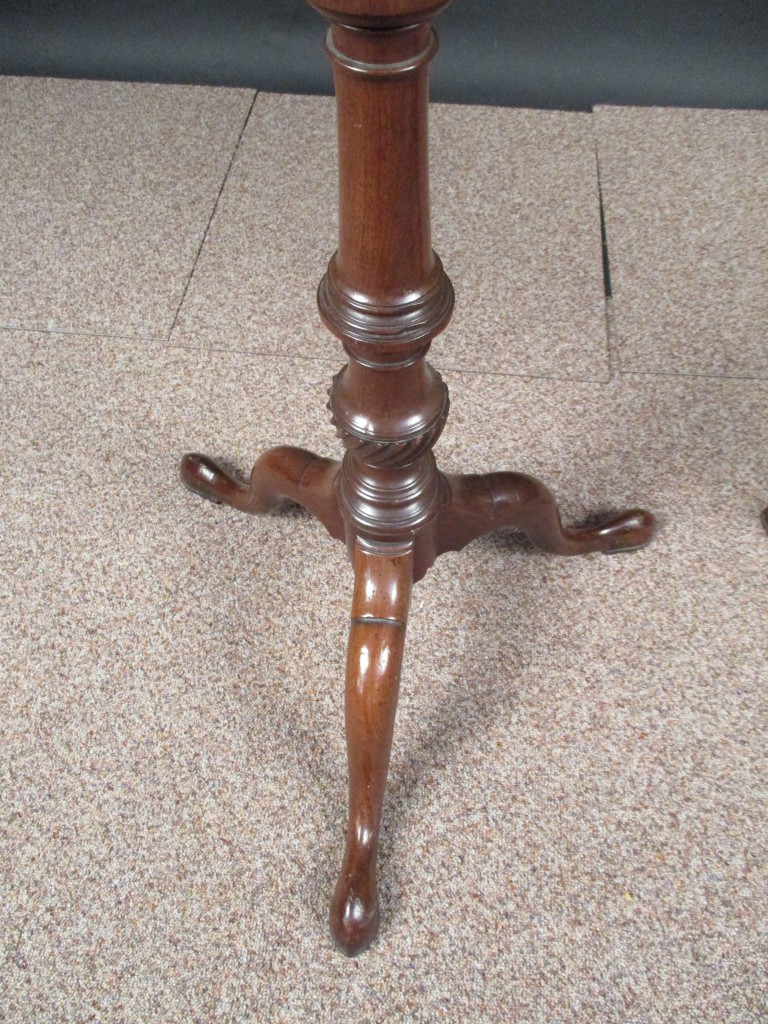 A George III mahogany pole screen, with arched needlepoint panel, on a turned moulded column and a - Image 3 of 3