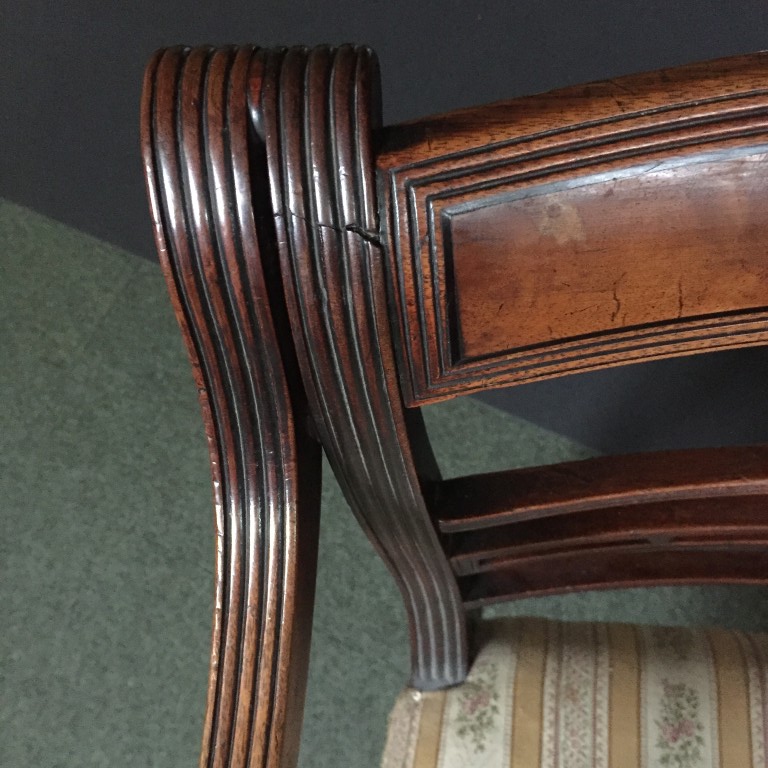 A Pair Regency mahogany bar back elbow dining chairs, with ebony line inlays, the reeded arms on - Image 2 of 4