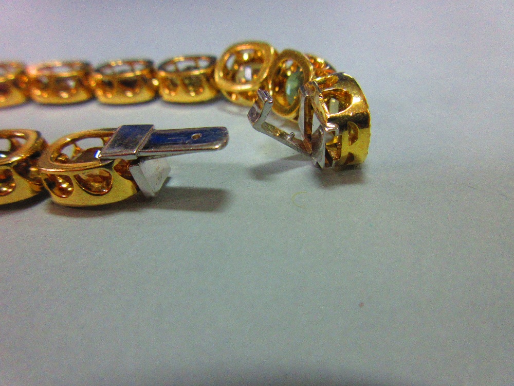 A multi gem set and diamond bracelet, each of the eighteen oval cut stones set in a border of - Image 6 of 8