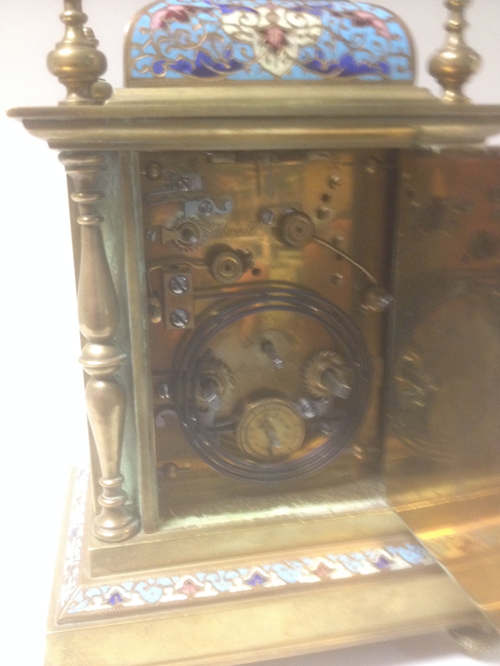 A late 19th century brass and enamelled mantle clock, with folding handle above repeat button, - Image 4 of 5