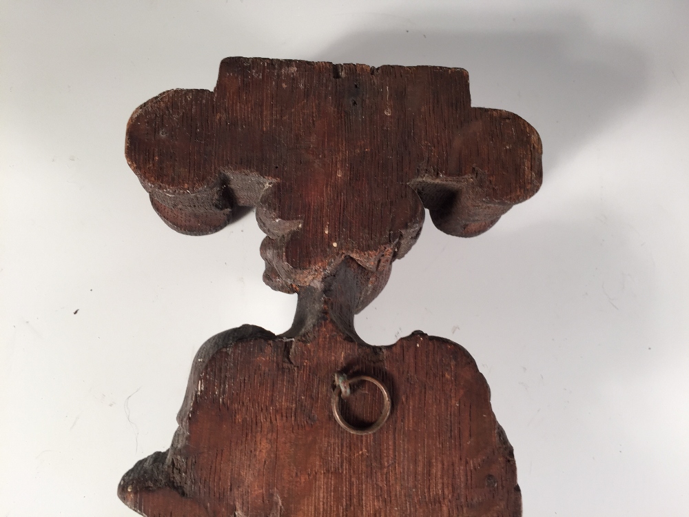 A 17th century oak term, carved as a lady in classical dress supporting an Ionic capital on her head - Image 3 of 3