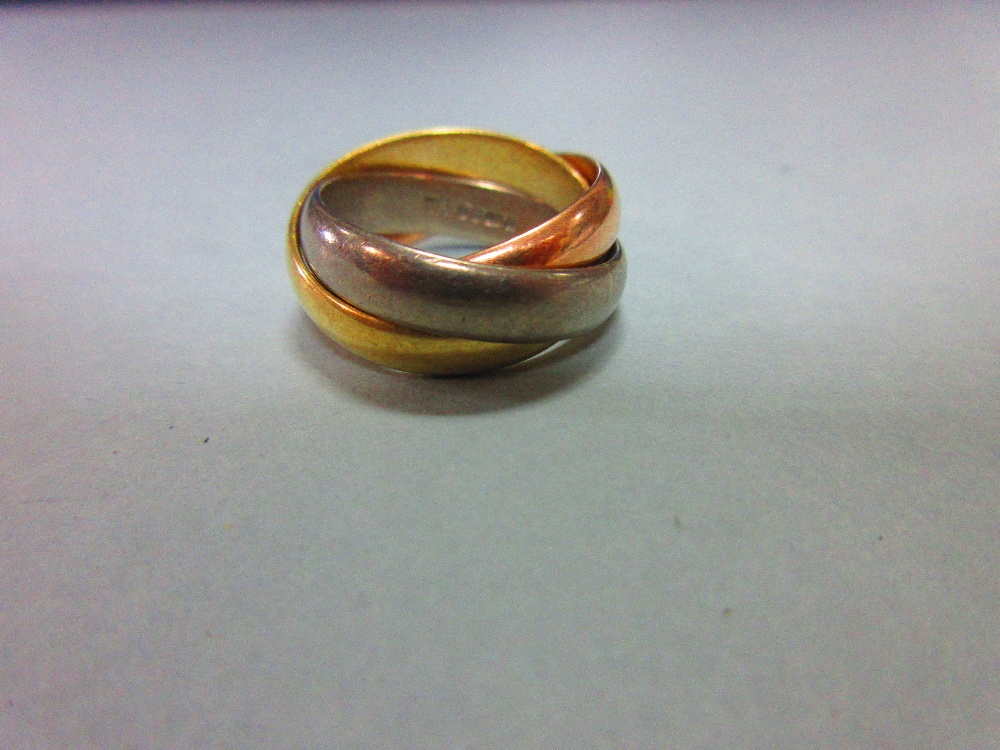 An 18ct three colour gold 'Russian wedding' ring, the three interlocking plain D-section bands, - Image 3 of 5