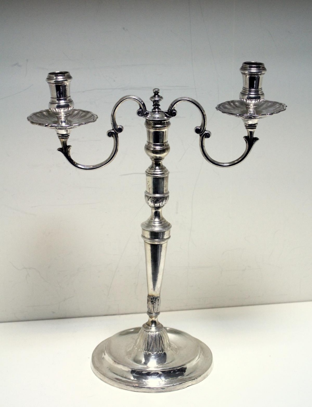 A pair of continental metalwares candelabra, unmarked, each raised from a circular foot with - Image 2 of 5