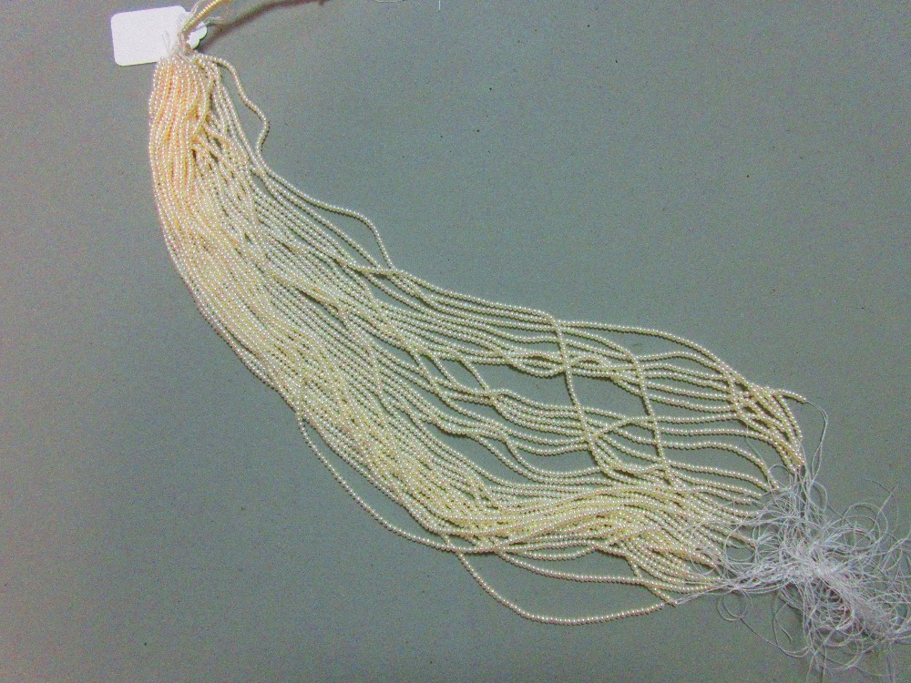 A skein of thirty three strings of 3mm cultured pearls, each string 40.5cm long, the pearls bouton - Image 3 of 3