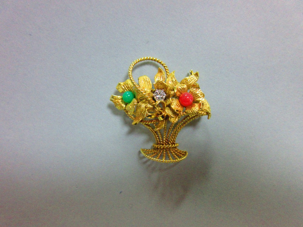 A diamond and gem set giardinetto brooch, the pierced and waisted basket and handle made of