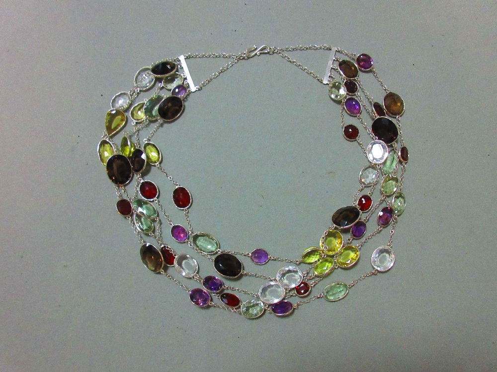 A five strand multi gemset necklace, composed of oval cut hessonite garnets, prasiolites, amethysts, - Image 5 of 7