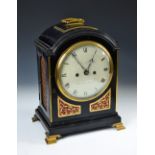 A Regency ebonised bracket clock by Desbois & Wheeler, London, the single pad top with brass handle,