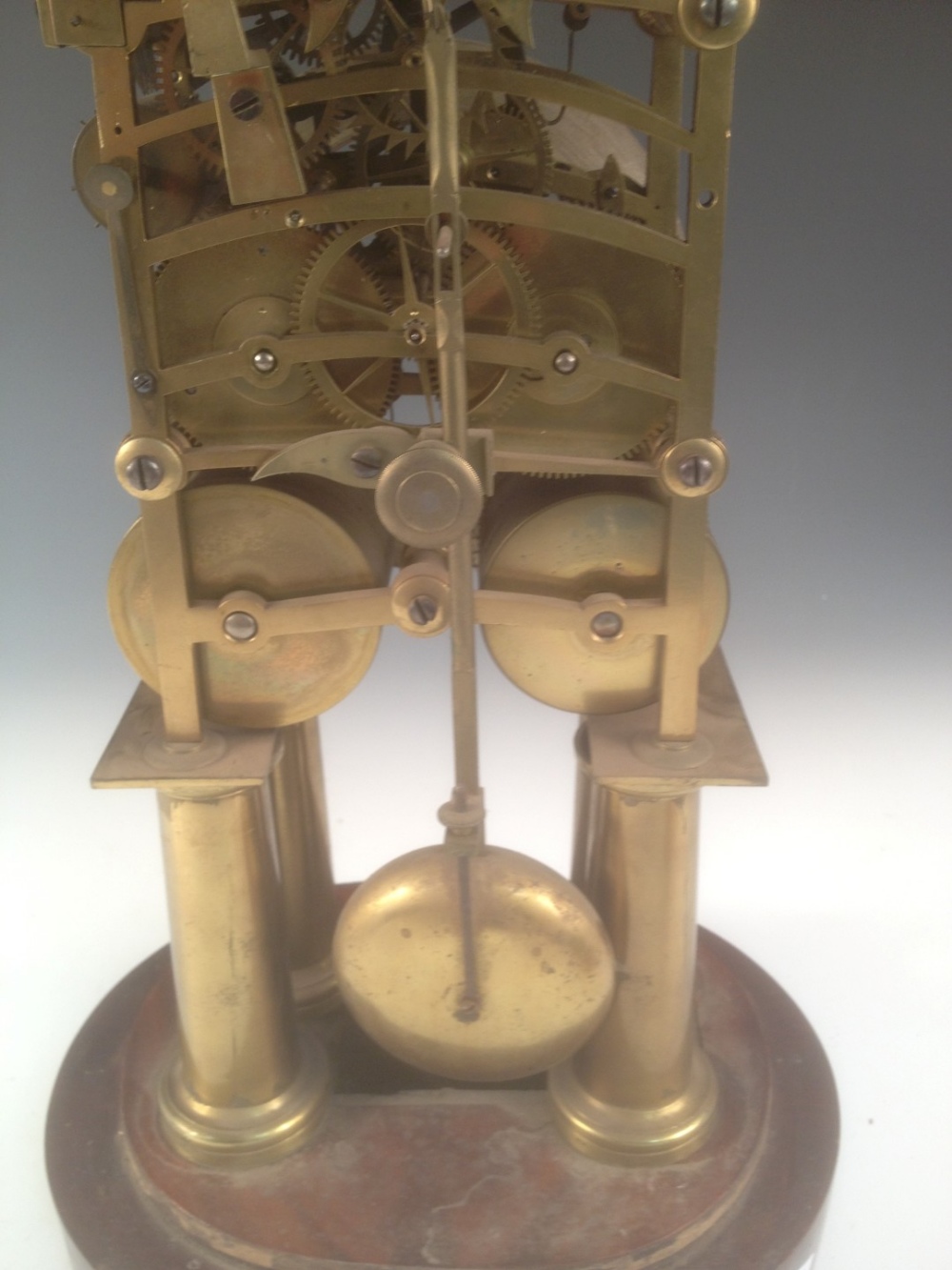 A Victorian brass bell chiming skeleton clock, the four tapering column legs supporting the twin - Image 5 of 6