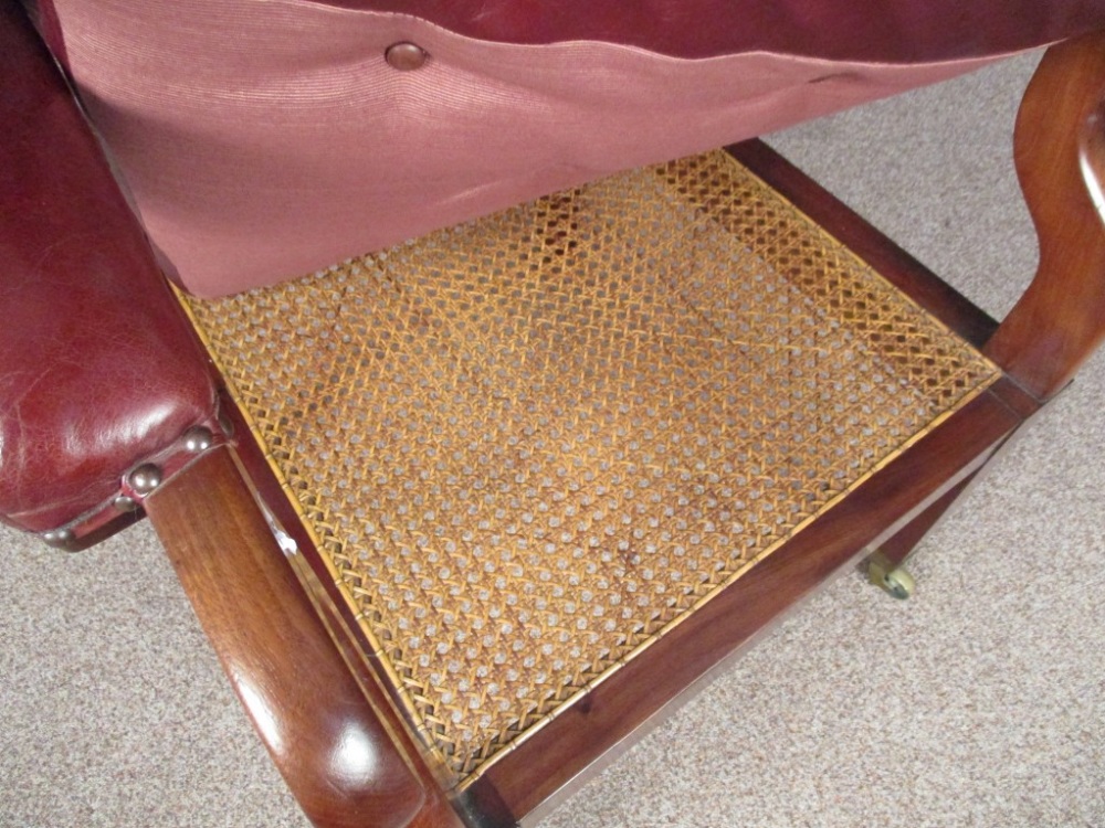 A Regency mahogany library bergere, the arms upholstered in red leather, cane seat with loose - Image 2 of 4