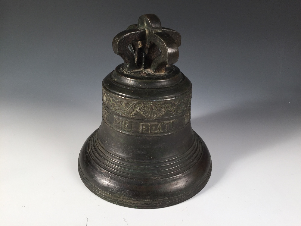 Du Mery Me Fecit Brugis A J 1749 + G', a bronze bell, so cast below a four ribbed open crown top and