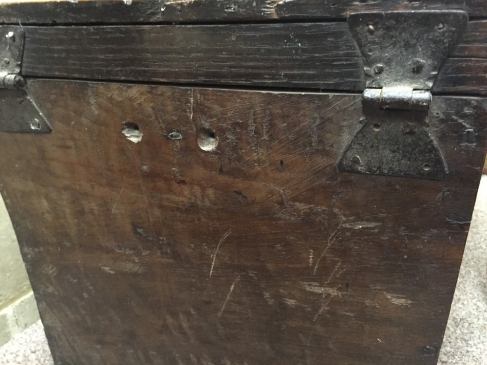 A small 17th century oak chest, a hinged top with false drawer fronts and brass handles, on later - Image 5 of 5