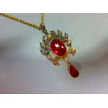 A belle époque fire opal, diamond and seed pearl pendant with chain, the oval cut fire opal collet