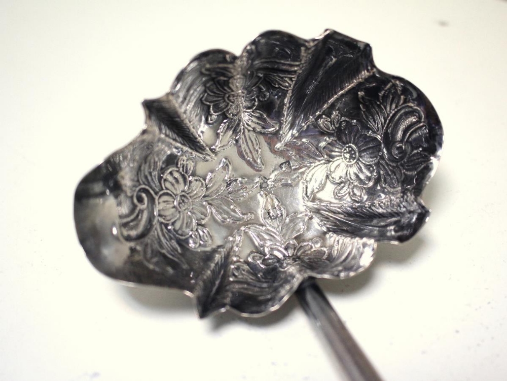 A George III silver punch ladle, by N S & A N, London 1766, the oval lobed bowl embossed with - Image 2 of 8