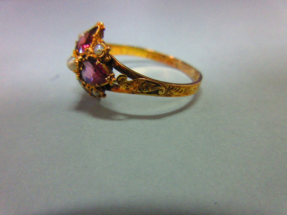 A mid Victorian 15ct gold, garnet and seed pearl quatrefoil ring, with four heart cut almandine - Image 3 of 6