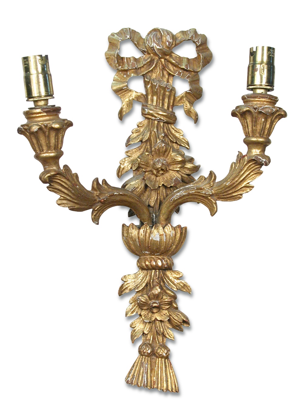 A set of four carved giltwood two branch wall lights, with ribbon tied floral pandant backs and