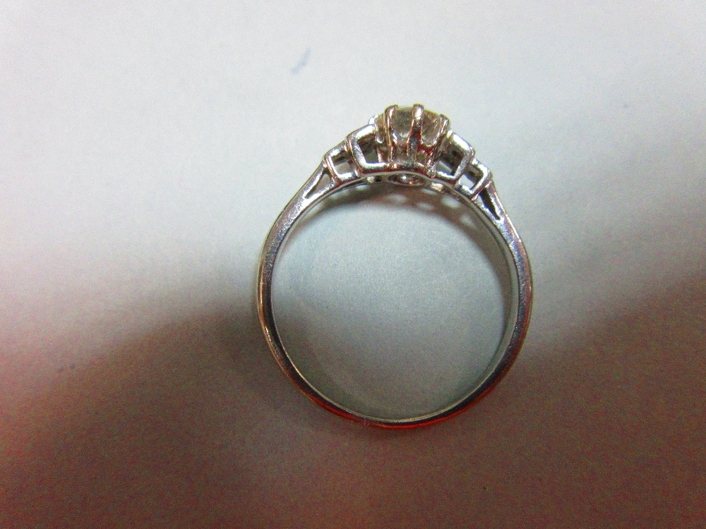 A diamond ring, the old round brilliant cut diamond claw set between stepped square millegrain edged - Image 2 of 5
