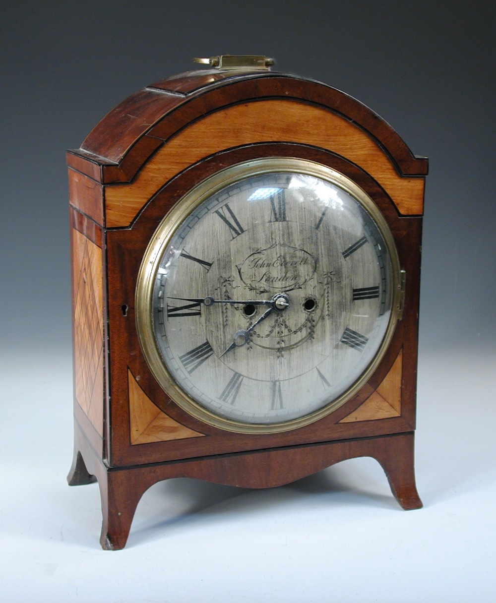 John Everett, London, a mahogany and satinwood banded bracket clock, the breakarch top with handle