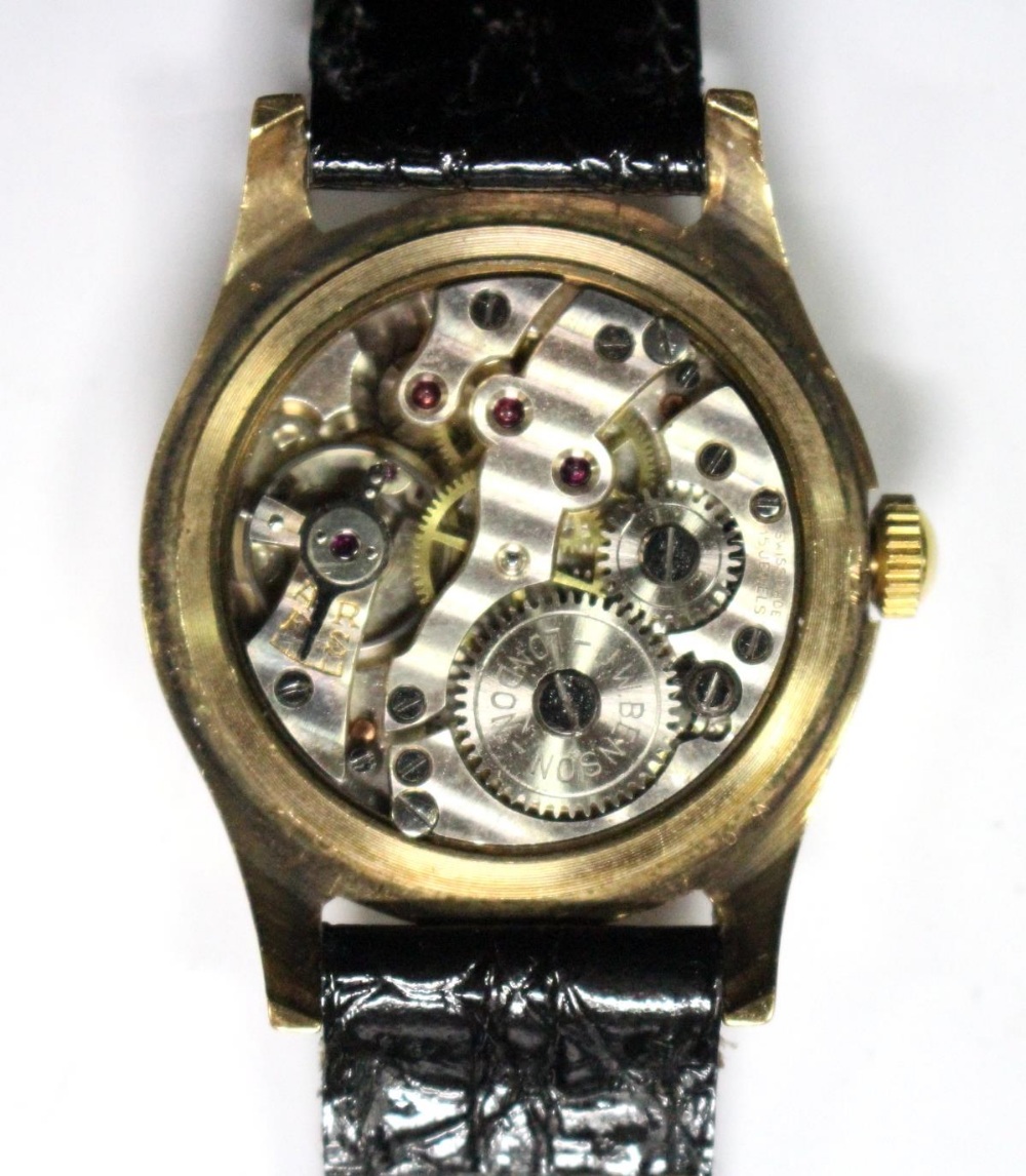 By Benson - a mid-sized 9ct gold cased wristwatch, (case Birmingham 1946), the white dial with black - Image 2 of 3