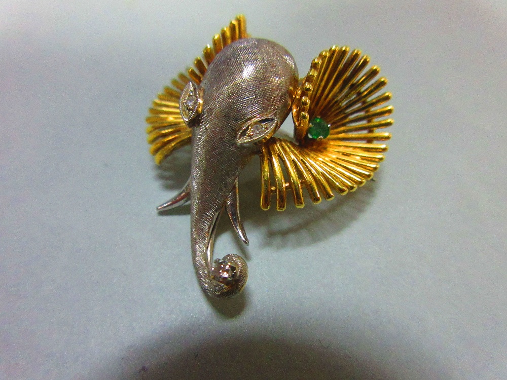 A bi-coloured precious metal, diamond and emerald set elephant head brooch, designed as a white - Image 3 of 6