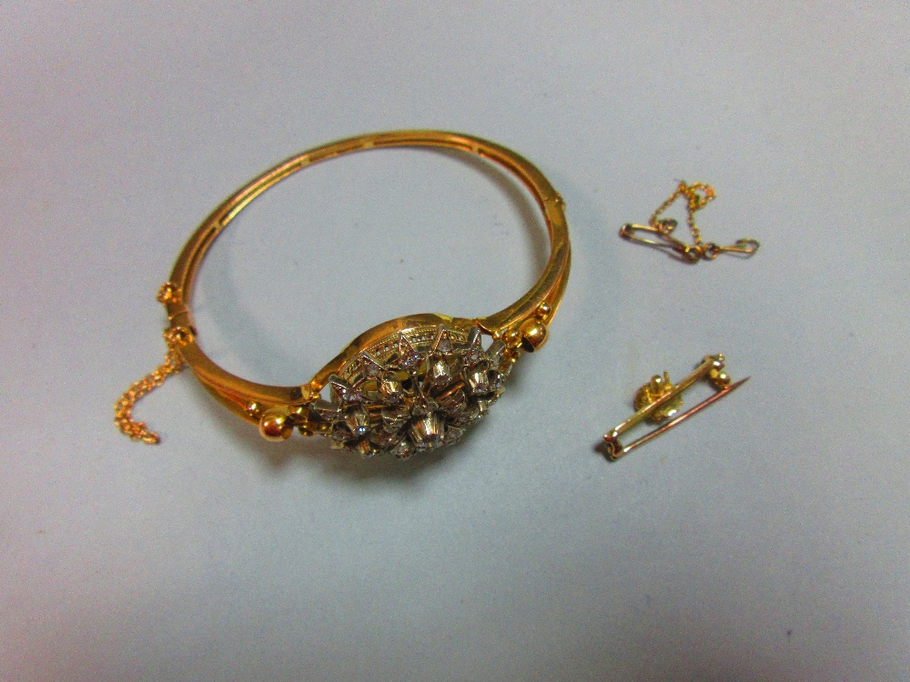 A Victorian diamond set hinged bangle / brooch, the bangle formed by knife-edge bars flaring at - Image 2 of 9