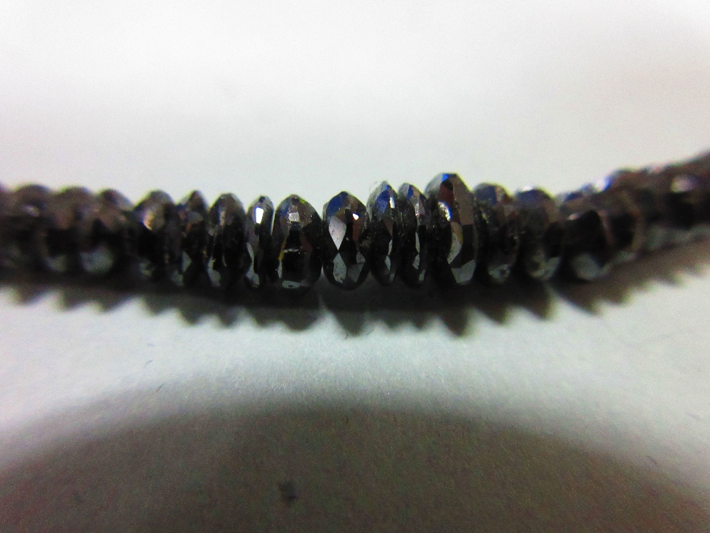 A black diamond bead necklace, the graduated 2.5 - 5.3mm diameter faceted black diamond beads, - Image 5 of 5