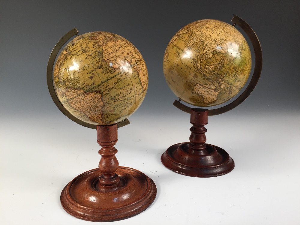 A Newton's terrestial 4.25 inch globe, circa 1845, varnished gores to a turned mahogany stand,