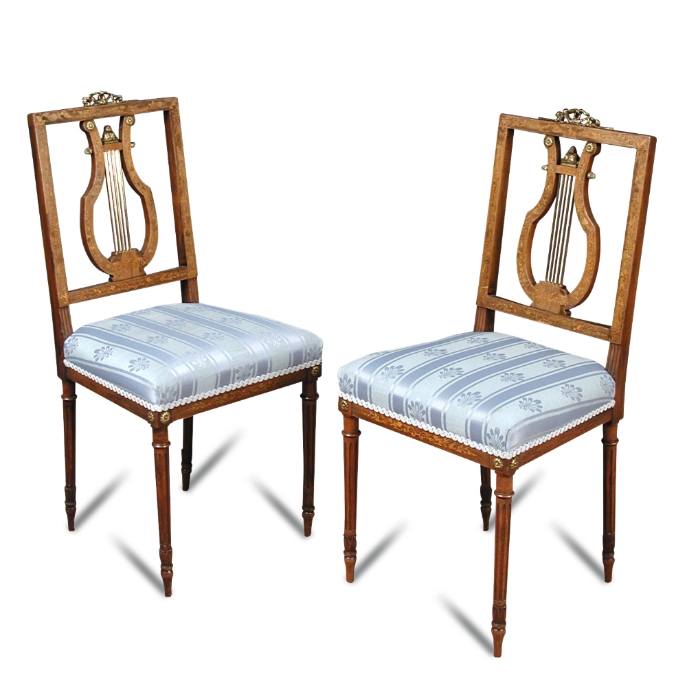 A pair of Louis XVI style rosewood salon chairs, bearing Edwards & Roberts label, with marquetry