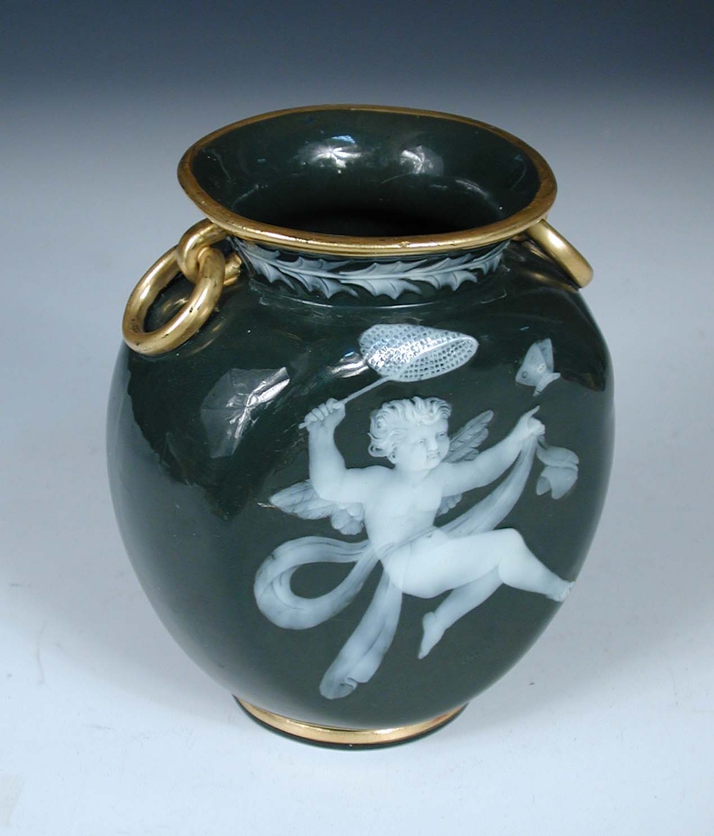 A George Jones pate sur pate vase, attributed to Frederick Schenk, worked with an amorini about to