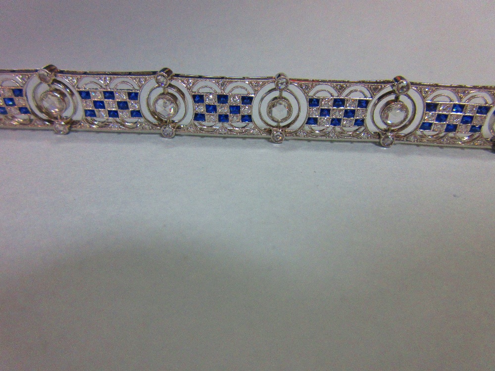 An art deco diamond and sapphire bracelet, designed as nine geometric pierced panels with a - Image 7 of 8