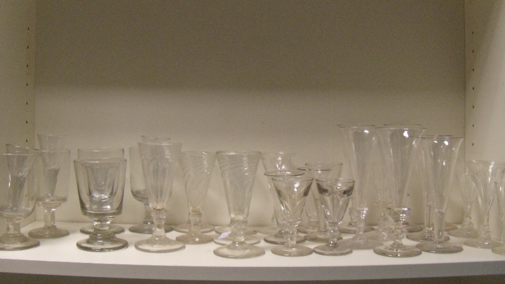 A selection of thirty three drinking glasses, largely 19th century, to include: six wrythen ales,
