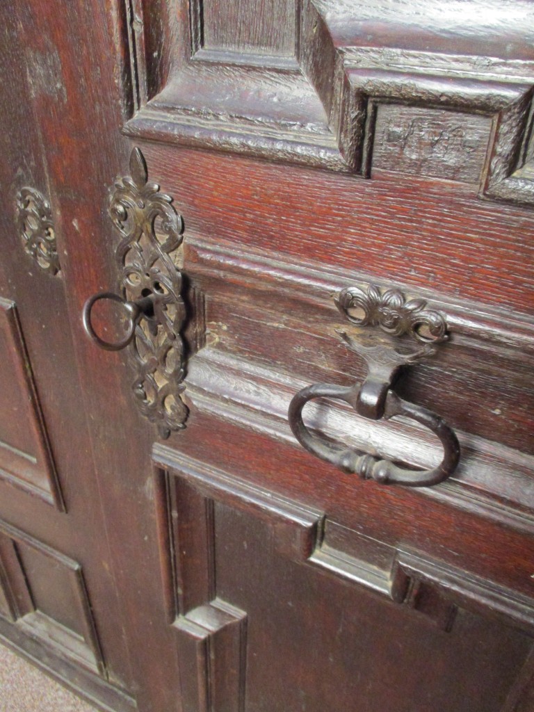 A 17th century Flemish oak panelled armoire, the frieze carved with monogram and date 1694, a - Image 3 of 5