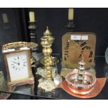 A brass cased presentation carriage clock, a pair of telescopic pewter candlesticks and other